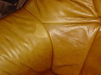 3-seater leather sofa worn and torn
